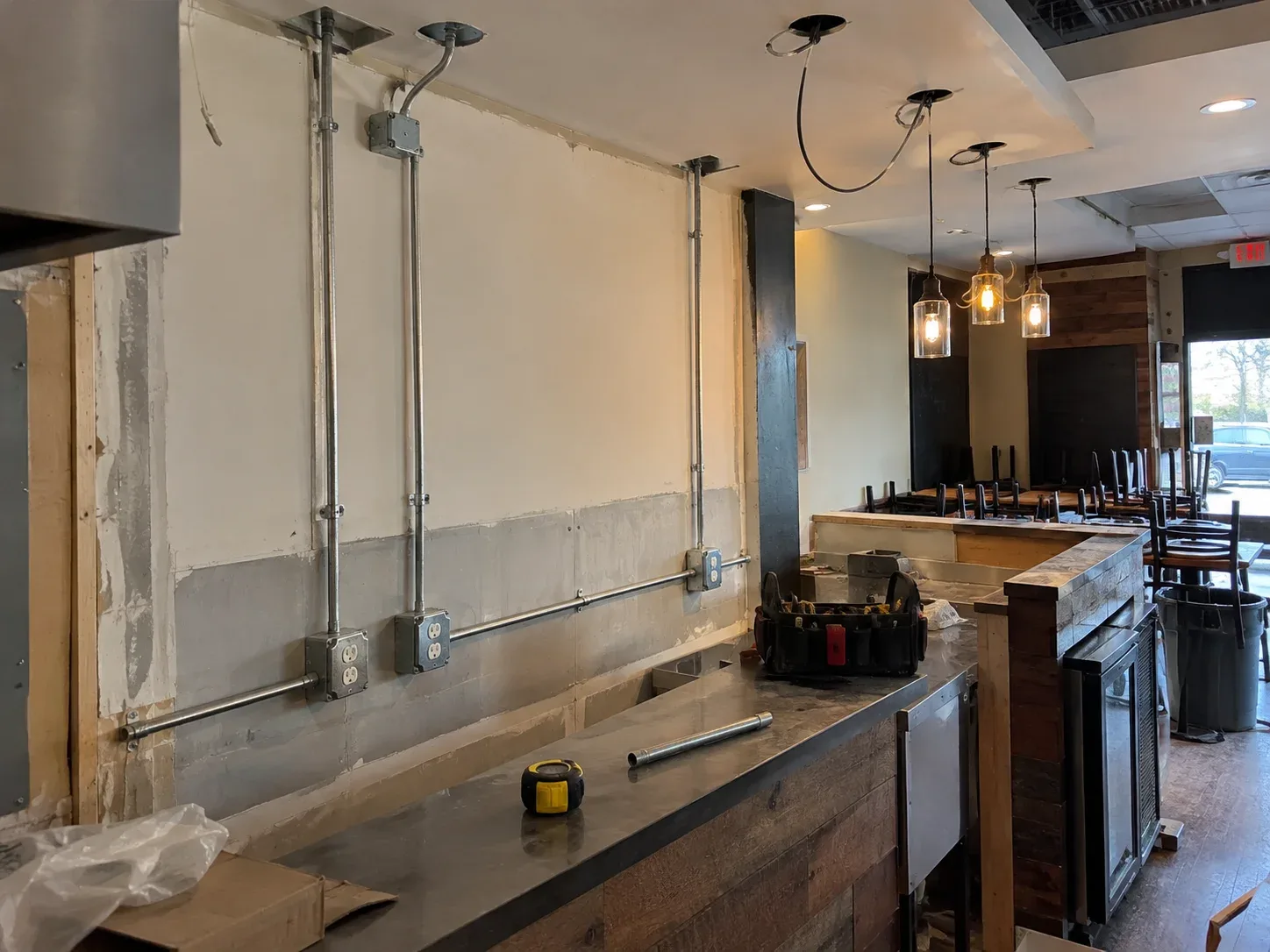 Electrical work in a restaurant or retail space during a commercial renovation