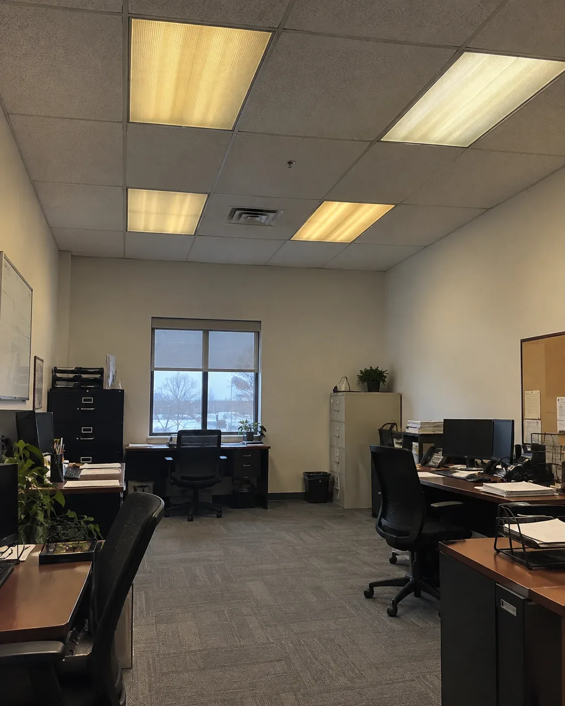 Commercial space with old fluorescent lighting before LED retrofit